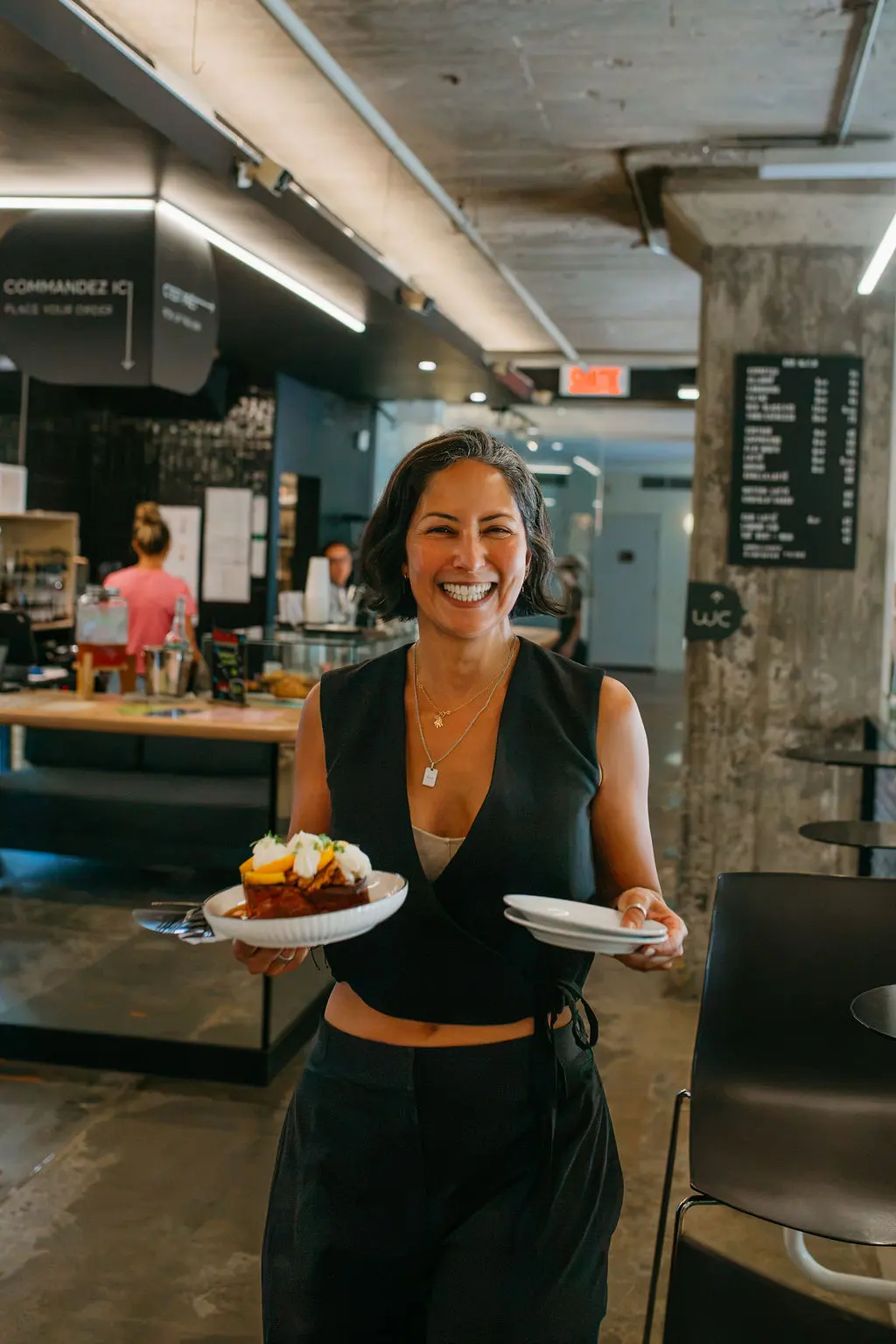 Founder Selma Gueddich inside Café Paper Hill