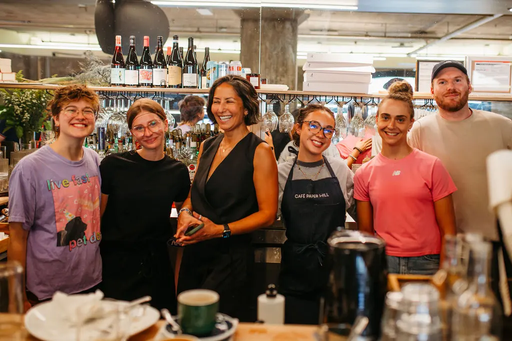 Selma and the Paper Hill team behind the café counter